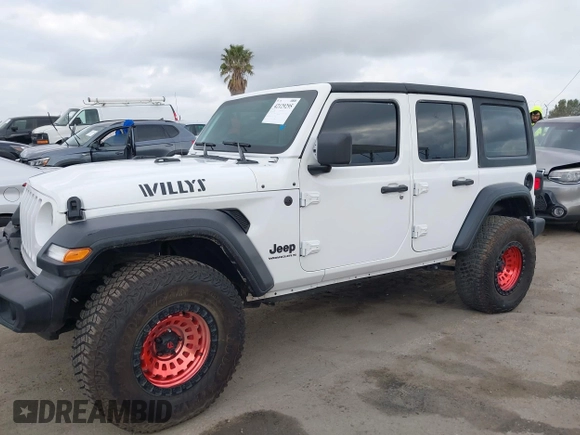 2023 Jeep Wrangler Sport S with VIN 1C4HJXDG0PW638871, listed as a IAAI auction lot 42129295 with 16,171 mi miles and . Bid and sale history available at DreamBid. Image 14.