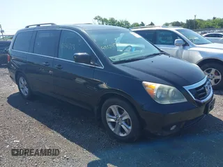 2008 Honda Odyssey Touring z VIN 5FNRL389X8B057385, wystawiony jako IAAI lot #42541713 z przebiegiem 187 482 mil mil oraz . Historia ofert i sprzedaży dostępna na DreamBid. Obrazek 1.