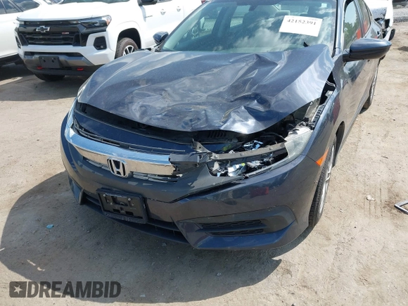 2018 Honda Civic LX with VIN 2HGFC2F53JH560402, listed as a IAAI auction lot 42152391 with 75,384 mi miles and . Bid and sale history available at DreamBid. Image 6.