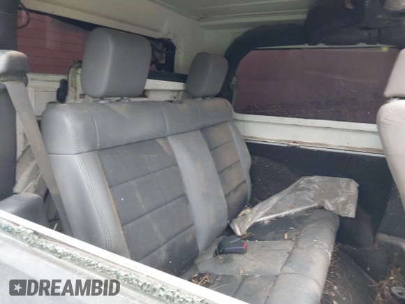 2009 Jeep Wrangler X with VIN 1J4FA24149L775557, listed as a IAAI auction lot 42363653 with Not provided miles and . Bid and sale history available at DreamBid. Image 8.