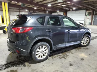 2013 Mazda CX-5 Touring with VIN JM3KE4CE8D0121607, listed as a Copart auction lot 56217965 with 143,861 mi miles and Clean Title. Bid and sale history available at DreamBid. Image 3.