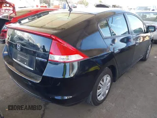 2010 Honda Insight LX with VIN JHMZE2H54AS021815, listed as a IAAI auction lot 42259951 with 137,436 mi miles and . Bid and sale history available at DreamBid. Image 4.