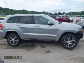 2018 Jeep Grand Cherokee Limited with VIN 1C4RJFBG7JC266715, listed as a IAAI auction lot 42562005 with 101,999 mi miles and . Bid and sale history available at DreamBid. Image 14.