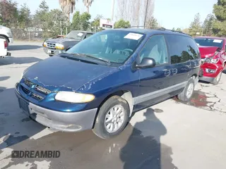 2000 Dodge Caravan SE with VIN 2B4GP45R9YR661145, listed as a IAAI auction lot 41819130 with 233,411 mi miles and . Bid and sale history available at DreamBid. Image 2.