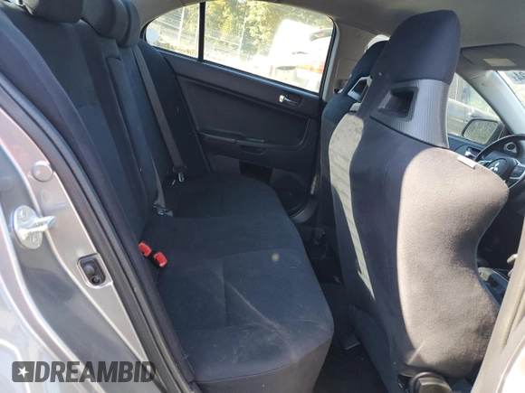 2014 Mitsubishi Lancer Evolution GSR z VIN JA32W8FV6EU018171, wystawiony jako Copart lot #77109934 z przebiegiem 83 467 mil mil oraz Tytuł czysty. Historia ofert i sprzedaży dostępna na DreamBid. Obrazek 10.