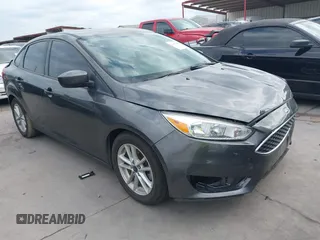 2018 Ford Focus SE with VIN 1FADP3F22JL295342, listed as a IAAI auction lot 42335881 with 77,464 mi miles and . Bid and sale history available at DreamBid. Image 1.