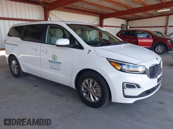 2021 Kia Sedona LX with VIN KNDMB5C15M6669588, listed as a IAAI auction lot 41757129 with 14,738 mi miles. Bid and sale history available at carsss.com. Image 1.