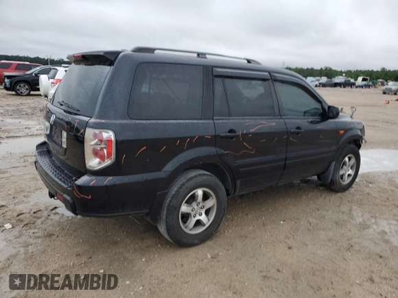 2006 Honda Pilot EX-L with VIN 5FNYF28516B003593, listed as a Copart auction lot 53879665 with 153,264 mi miles and Salvage Title. Bid and sale history available at DreamBid. Image 3.
