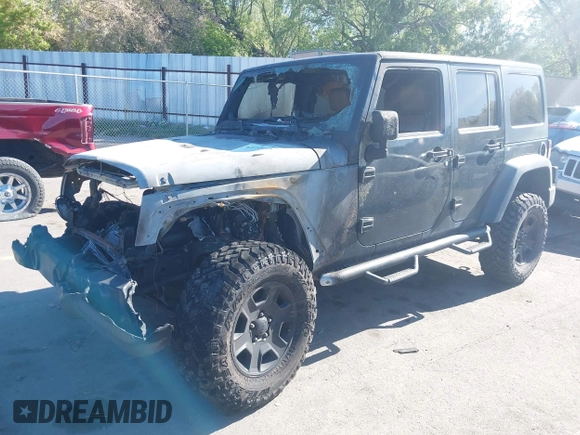 2011 Jeep Wrangler Unlimited Rubicon with VIN 1J4BA6H16BL615945, listed as a IAAI auction lot 42159418 with Not provided miles and . Bid and sale history available at DreamBid. Image 2.
