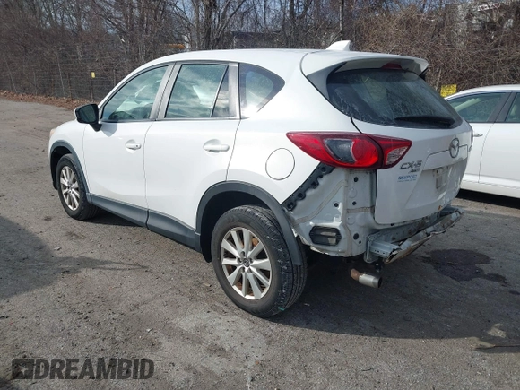 2013 Mazda CX-5 Sport with VIN JM3KE4BE5D0165212, listed as a IAAI auction lot 41332056 with 150,301 mi miles. Bid and sale history available at carsss.com. Image 3.