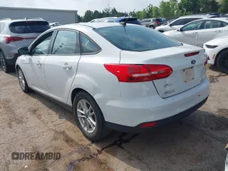 2015 Ford Focus SE with VIN 1FADP3F22FL376042, listed as a IAAI auction lot 42283236 with 76,675 mi miles and . Bid and sale history available at DreamBid. Image 3.