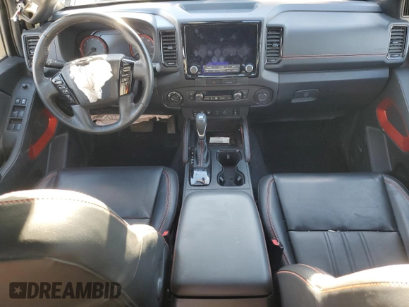 2023 Nissan Frontier Pro-4X z VIN 1N6ED1EK0PN610517, wystawiony jako Copart lot #87213324 z przebiegiem 51 648 mil mil oraz Szkoda całkowita • Salvage title. Historia ofert i sprzedaży dostępna na DreamBid. Obrazek 8.