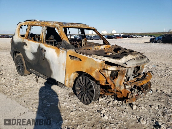 2016 Infiniti QX80 with VIN JN8AZ2NE1G9122953, listed as a Copart auction lot 71239384 with 0 mi miles and Salvage Title. Bid and sale history available at carsss.com. Image 4.