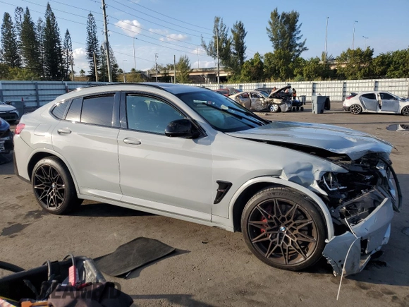 2022 BMW X4 M z VIN 5YM23EC00N9L35827, wystawiony jako Copart lot #87932635 z przebiegiem Nie podano mil oraz Szkoda całkowita • Salvage title. Historia ofert i sprzedaży dostępna na DreamBid. Obrazek 4.