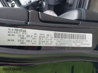 2019 Jeep Grand Cherokee Laredo E with VIN 1C4RJEAGXKC571770, listed as a IAAI auction lot 41677487 with 113,089 mi miles. Bid and sale history available at carsss.com. Image 9.