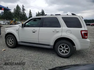 2010 Ford Escape Limited with VIN 1FMCU9EG5AKA70316, listed as a Copart auction lot 62413205 with 106,936 mi miles and Salvage title. Bid and sale history available at DreamBid. Image 2.