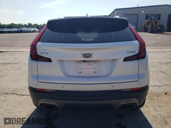 2020 Cadillac XT4 FWD Premium Luxury with VIN 1GYFZCR4XLF101193, listed as a Copart auction lot 59968145 with 135,218 mi miles and Salvage title. Bid and sale history available at DreamBid. Image 6.