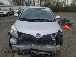 2011 Scion xD with VIN JTKKU4B44B1014235, listed as a Copart auction lot 52817715 with 96,941 mi miles and Salvage Title. Bid and sale history available at carsss.com. Image 5.