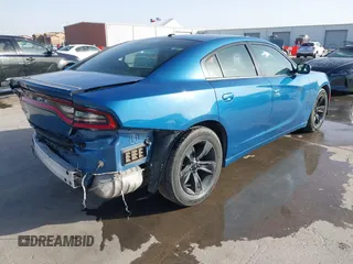 2021 Dodge Charger SXT with VIN 2C3CDXBG1MH518113, listed as a IAAI auction lot 41836023 with 73,091 mi miles. Bid and sale history available at carsss.com. Image 4.