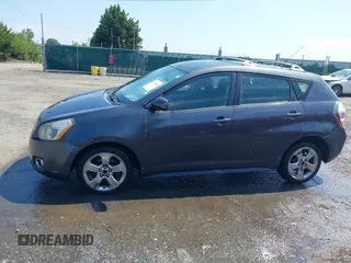 2009 Pontiac Vibe with VIN 5Y2SM67009Z462332, listed as a IAAI auction lot 42620669 with 164,227 mi miles and . Bid and sale history available at DreamBid. Image 14.