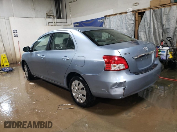 2010 Toyota Yaris with VIN JTDBT4K35A4064446, listed as a Copart auction lot 52099855 with 61,934 mi miles and Salvage Title. Bid and sale history available at carsss.com. Image 2.
