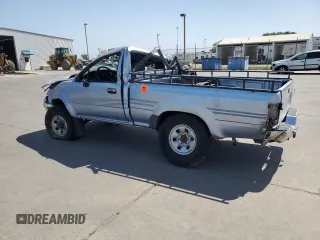 1991 Toyota Pickup DX с VIN JT4RN01P7M0018845, выставлен на аукционе Copart как лот 58569615 с пробегом 275 355 миль миль и Списание • Salvage title. История ставок и продаж доступна на DreamBid. Изображение 2.