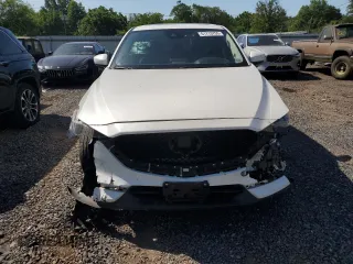2019 Mazda CX-5 Grand Touring with VIN JM3KFBDM2K1663140, listed as a Copart auction lot 61713755 with 68,101 mi miles and Salvage title. Bid and sale history available at DreamBid. Image 5.
