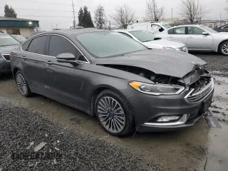 2018 Ford Fusion Titanium with VIN 3FA6P0D92JR193919, listed as a Copart auction lot 42188094 with 99,939 mi miles and Salvage title. Bid and sale history available at DreamBid. Image 4.