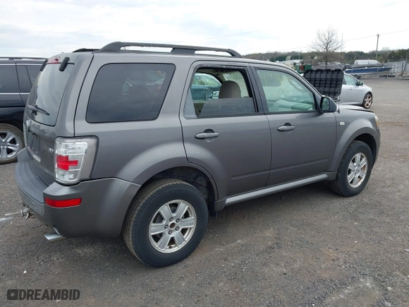 2009 Mercury Mariner with VIN 4M2CU91G49KJ05721, listed as a IAAI auction lot 41919006 with 105,537 mi miles. Bid and sale history available at carsss.com. Image 4.