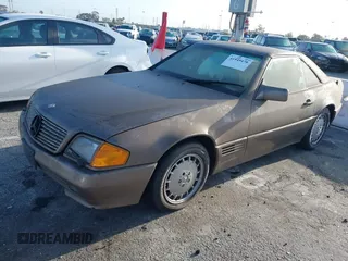 1992 Mercedes-Benz 500 с VIN WDBFA66EXNF055989, выставлен на аукционе IAAI как лот 41949478 с пробегом 123 283 миль миль и . История ставок и продаж доступна на DreamBid. Изображение 2.