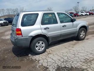 2007 Ford Escape XLS with VIN 1FMYU02Z97KB80446, listed as a IAAI auction lot 42113186 with 128,492 mi miles. Bid and sale history available at carsss.com. Image 4.