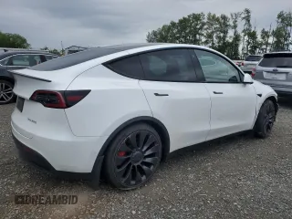 2022 Tesla Model Y Performance with VIN 7SAYGDEFXNF396758, listed as a Copart auction lot 59006365 with 47,882 mi miles and Salvage title. Bid and sale history available at DreamBid. Image 3.