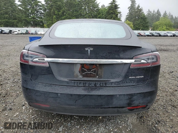 2019 Tesla Model S 75D with VIN 5YJSA1E28KF349241, listed as a Copart auction lot 55279595 with 77,005 mi miles and Salvage title. Bid and sale history available at DreamBid. Image 6.