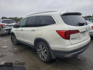 2017 Honda Pilot Touring with VIN 5FNYF6H99HB025600, listed as a Copart auction lot 88131475 with 131,939 mi miles and Salvage Title. Bid and sale history available at DreamBid. Image 2.