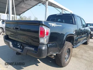 2022 Toyota Tacoma SR5 with VIN 3TMBZ5DN6NM034630, listed as a IAAI auction lot 42733932 with 43,309 mi miles and . Bid and sale history available at DreamBid. Image 4.