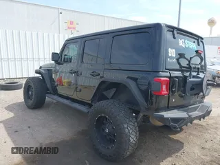 2020 Jeep Wrangler Unlimited Sahara with VIN 1C4HJXEG6LW211932, listed as a IAAI auction lot 42040546 with 74,732 mi miles and . Bid and sale history available at DreamBid. Image 3.