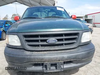 2003 Ford F-150 XL with VIN 1FTRX17263NB88093, listed as a IAAI auction lot 41772955 with 1 mi miles. Bid and sale history available at carsss.com. Image 6.