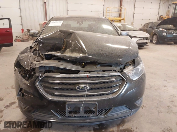 2014 Ford Taurus Limited z VIN 1FAHP2J88EG112614, wystawiony jako IAAI lot #42135220 z przebiegiem 70 409 mil mil oraz . Historia ofert i sprzedaży dostępna na DreamBid. Obrazek 6.