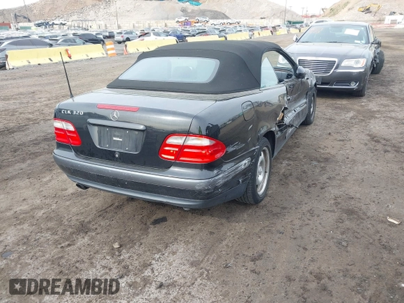 1999 Mercedes-Benz CLK with VIN WDBLK65G1XT013704, listed as a IAAI auction lot 42115880 with 85,741 mi miles. Bid and sale history available at carsss.com. Image 4.