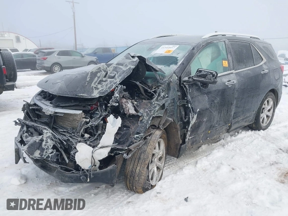 2021 Chevrolet Equinox Premier z VIN 3GNAXXEV2MS137119, wystawiony jako IAAI lot #41344057 z przebiegiem Nie podano mil oraz . Historia ofert i sprzedaży dostępna na DreamBid. Obrazek 2.