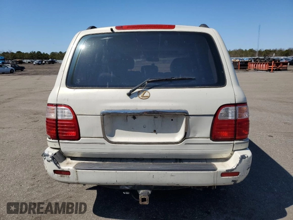 2000 Lexus LX 470 z VIN JT6HT00W1Y0096061, wystawiony jako Copart lot #52499155 z przebiegiem 199 914 mil mil oraz Tytuł czysty. Historia ofert i sprzedaży dostępna na DreamBid. Obrazek 6.