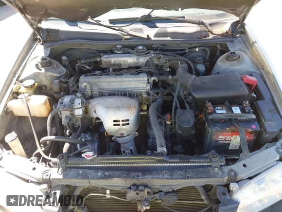 2000 Toyota Camry CE z VIN JT2BG22K6Y0451632, wystawiony jako IAAI lot #42030842 z przebiegiem 200 734 mil mil oraz . Historia ofert i sprzedaży dostępna na DreamBid. Obrazek 10.