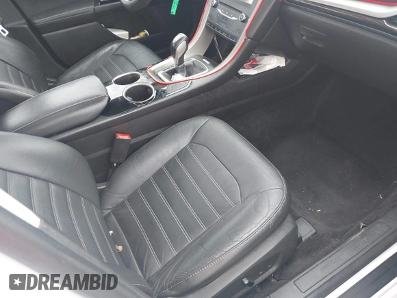 2014 Ford Fusion SE Hybrid с VIN 3FA6P0LUXER125766, выставлен на аукционе IAAI как лот 42178177 с пробегом 284 385 миль миль и . История ставок и продаж доступна на DreamBid. Изображение 5.