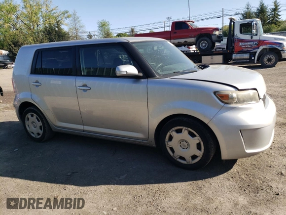 2010 Scion xB with VIN JTLZE4FEXA1098327, listed as a Copart auction lot 54733025 with 151,331 mi miles and Salvage Title. Bid and sale history available at DreamBid. Image 4.