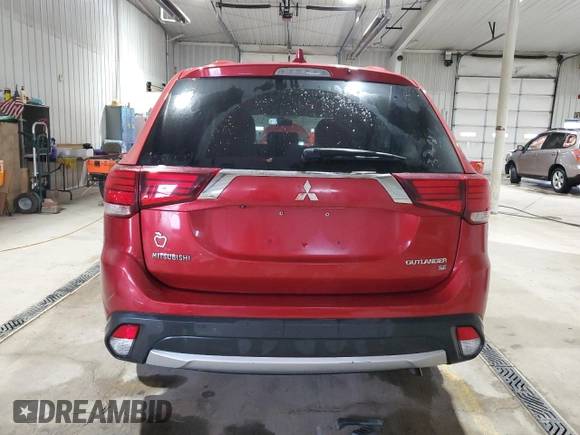 2018 Mitsubishi Outlander SE с VIN JA4AD3A33JZ039563, выставлен на аукционе Copart как лот 57807135 с пробегом 215 879 миль миль и Списание • Salvage title. История ставок и продаж доступна на DreamBid. Изображение 6.