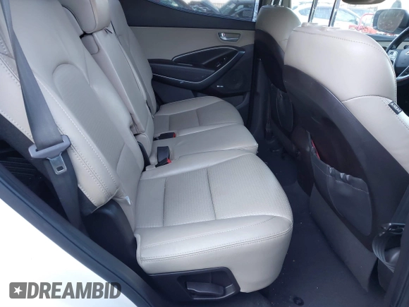 2014 Hyundai Santa Fe with VIN 5XYZUDLB4EG129473, listed as a IAAI auction lot 40978108 with 169,997 mi miles and . Bid and sale history available at DreamBid. Image 8.