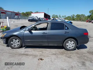 2005 Honda Accord LX with VIN 1HGCM56465A045312, listed as a IAAI auction lot 42060427 with 151,467 mi miles and . Bid and sale history available at DreamBid. Image 14.
