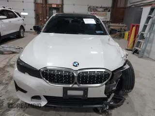 2019 BMW 3 Series 330i xDrive with VIN WBA5R7C55KAJ83482, listed as a IAAI auction lot 41565321 with 126,536 mi miles. Bid and sale history available at carsss.com. Image 12.