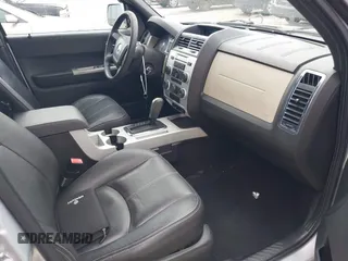 2008 Mercury Mariner Premier with VIN 4M2CU87108KJ01466, listed as a IAAI auction lot 42634600 with 95,436 mi miles and . Bid and sale history available at DreamBid. Image 5.