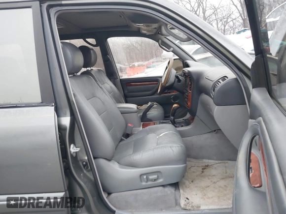 2002 Lexus LX 470 with VIN JTJHT00W923515897, listed as a IAAI auction lot 41155492 with 244,619 mi miles. Bid and sale history available at carsss.com. Image 5.